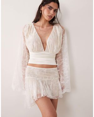 I.AM.GIA Stevie Lace Ruffle Dropped Waist Asymmetric Detail Mini Skirt - Natural