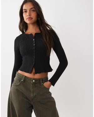 ASOS Oberteil mit strukturierter oberfläche, schmaler passform, durchgehender knopfleiste und langen ärmeln - Schwarz
