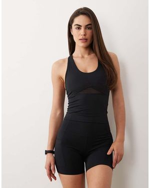 4505 Leggings Cortos Deportivos De 13 Cm Negros De Talle Alto Con Cintura Marcada De