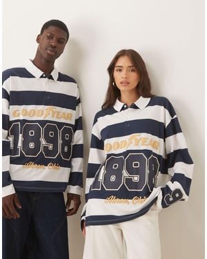 ASOS Unisex Oversized Long Sleeve Polo Shirt With Goodyear Print - Blue