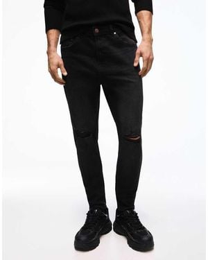 Bershka Ripped Carrot Fit Jeans - Black