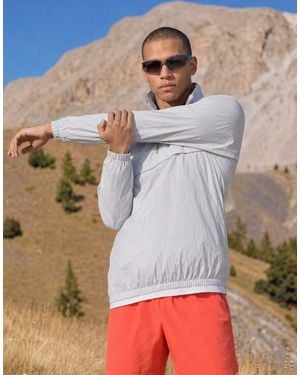 4505 Ultra Lightweight Water Repellent 1/4 Zip Running Windbreaker With Front Pocket - White