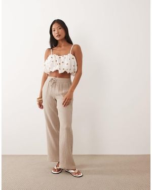 JDY Petite Pantalon large en gaze - beige - Neutre