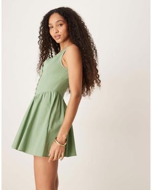 ASOS Robe boutonnée courte à col v et taille basse - pistache - Vert