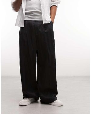 Weekday Pantalones De Sastre Negros De Pernera Ancha Con Pinzas Delanteras De Lino De