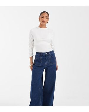 ASOS Asos Design Petite High Waist Wide Leg Jeans With Front Pockets - Blue
