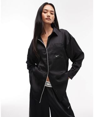 Nike – langärmlige hemdbluse aus satin - Schwarz