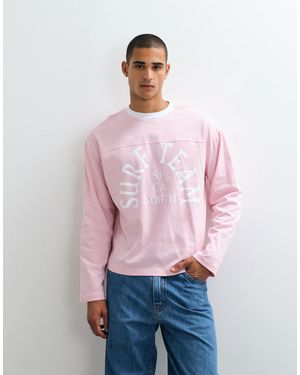 ASOS T-shirt oversize coupe carrée à manches longues avec imprimé surf team - Rouge