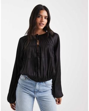 WeWoreWhat Blusa Negra Con Lazada Delantera Y Mangas Cocoon De - Negro