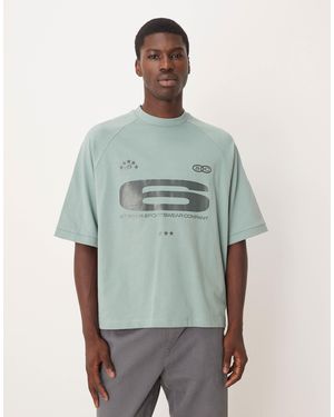 ASOS Heavyweight Boxy Oversized Raglan T-Shirt With Glossy Sports Graphic - Green