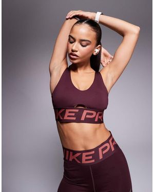Nike Sujetador Deportivo Escotado De Sujeción Baja Dri-Fit Indy De Nike Pro Training-Rojo - Morado
