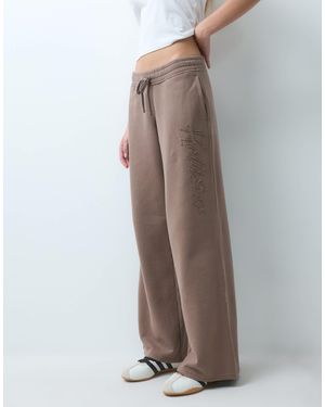 Hollister Low Rise baggy Trackies With Side Logo Graphic - Brown