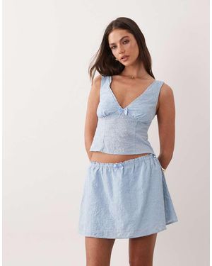 The Frolic Exclusive Cotton Bow Detail Frill Mini Skirt - Blue