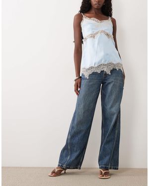 Calvin Klein Jean barrel taille basse délavage moyen - Bleu