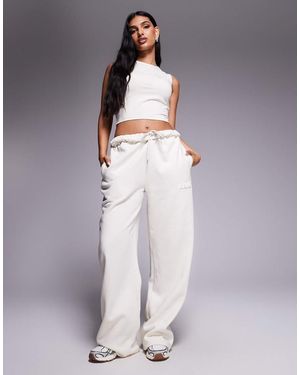 Kaiia Bubble Embossed Logo Wide Logo Trackies - Grey