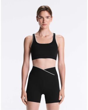 Oysho Sport-bh mit mittlerem halt und comfortlux mit kontrastnähten - Schwarz