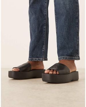 Calvin Klein Jeans Flatform Leather Monogram Sandal - Blue