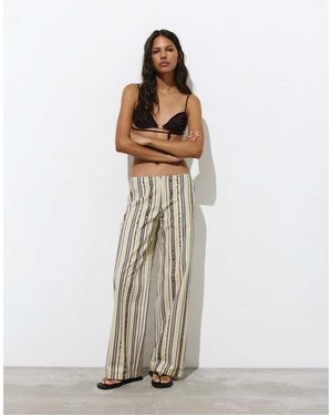 Pull&Bear Gestreepte Broek Met Wijde Pijpen En Lovertjes - Wit