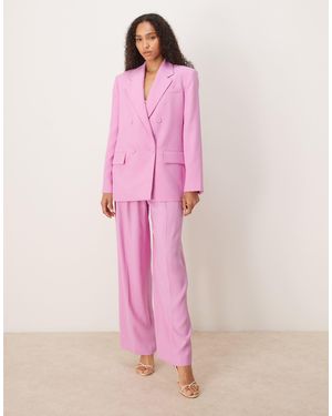 Mango Pantalon ajusté d'ensemble à plis devant - clair - Rose