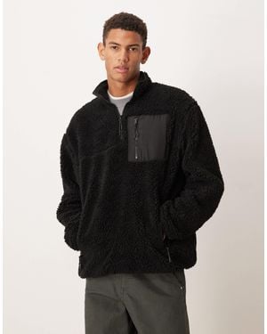 ASOS Relaxed Teddy Quarter Zip Sweatshirt With Pocket - Black
