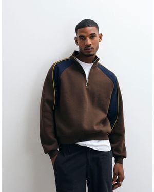 ASOS Relaxed 1/4 Zip With Cut & Sew Paneling And Contrast Piping - Black