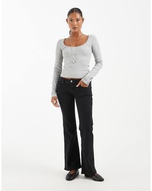 Only Petite Lola Super Low Waist Flared Jeans - White