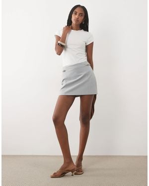 Abercrombie & Fitch Scarlett - mini-jupe taille haute à carreaux pied-de-poule - Blanc