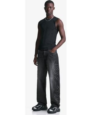 Bershka Jeans Ampi Neri Con Toppe - Nero