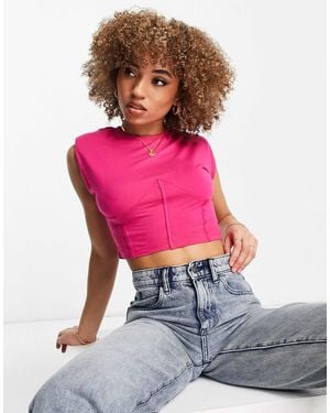 Rebellious Fashion – kurzes oberteil mit schulterpolstern und ziernähten - Pink