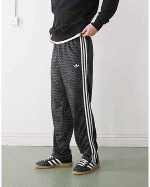 adidas Originals Firebird Loose Monogram Track Trousers - Black