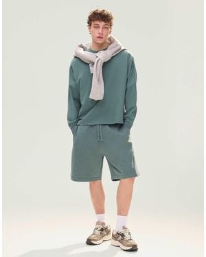 Bershka – basic-bermudashorts aus fleece - Blau