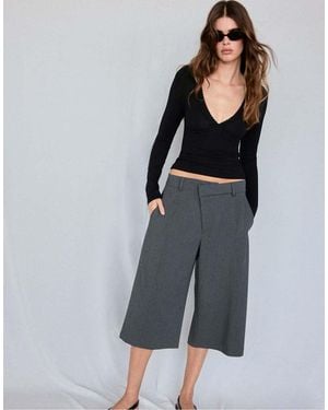 Stradivarius Top Met Lange Mouwen, V-Hals En Kant - Zwart
