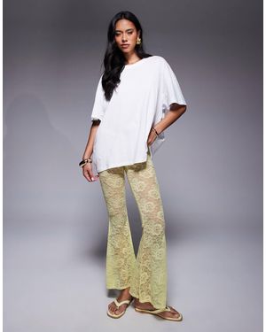 ASOS Extreme Flare High Waist Sheer Lace Trouser - Yellow