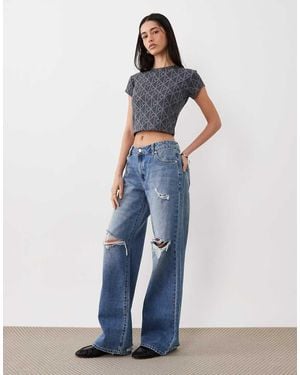 Calvin Klein Embossed Logo Cropped Baby Tee - Blue