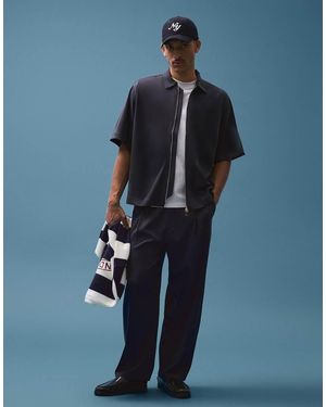 Bershka Fluid Super baggy Darted Trousers - Blue