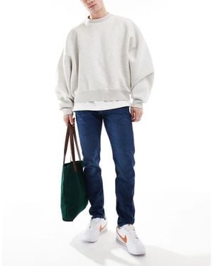 Calvin Klein Slim Tapered Jeans - White