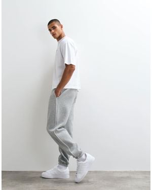 ASOS Jogger avec chevilles resserrées et passepoils - chiné - Blanc