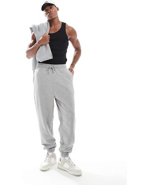 ASOS – essential – oversize-jogginghose - Grau