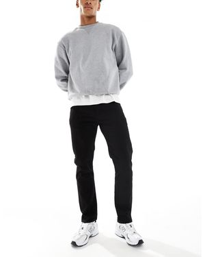 Levi's Vaqueros Negros De Corte Tapered 502 De - Blanco