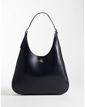 Calvin Klein Large Sleek Bucket Bag Wit Details - Blue