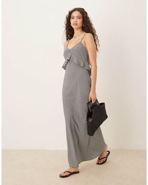 ASOS Robe à carreaux longue avec volants et bretelles fines - noir/blanc - Neutre