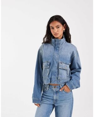 Tommy Hilfiger Veste fonctionnelle en jean - délavage moyen - Bleu