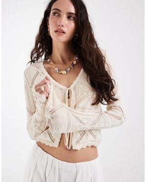 Vero Moda Gilet crocheté à motif avec liens noués à l'avant - crème - Neutre