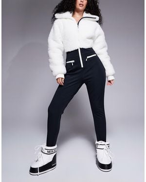 ASOS 4505 Ski & Snow 4505 Hourglass Ski Suit With Faux Fur Panels And Skinny Legs - Blue
