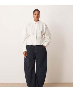 ARRANGE Curve Tova Tapered Curved Leg Jeans With Roll Hem - White