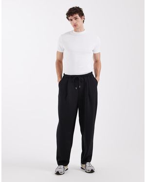 ASOS Ruimvallende Toelopende Joggingbroek Van Zware Scuba-Achtige Stof - Wit