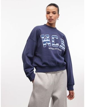 ASOS Weekend collective - sweat oversize à rayures et logo style universitaire - Bleu