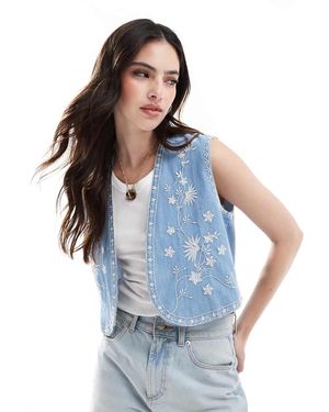ASOS Chaleco Vaquero Medio Con Diseño Bordado De Denim Suave De - Azul