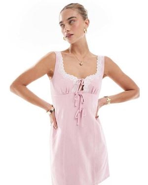 The Frolic Exclusive Linen Blend Contrast Lace Trim Tie Front Detail Mini Dress - Pink