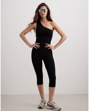 Aim'n Legging 3/4 sans coutures effet sculptant - Noir